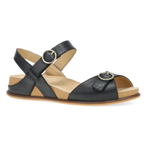 Dansko Women's Candace Sandal in black burnished nappa leather, featuring an adjustable ankle strap, cushioned EVA footbed, and durable rubber outsole for style and comfort.