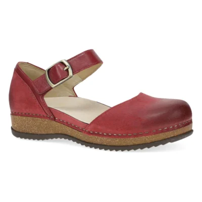 Dansko Women's Mae Mary Jane in red burnished suede, featuring an adjustable strap, memory foam cushioning, and lightweight EVA outsole for comfort and style.