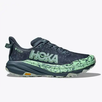 Hoka Women's Speedgoat 6 GTX trail running shoe with waterproof GORE-TEX membrane, Vibram Megagrip outsole, and durable design for rugged trails.