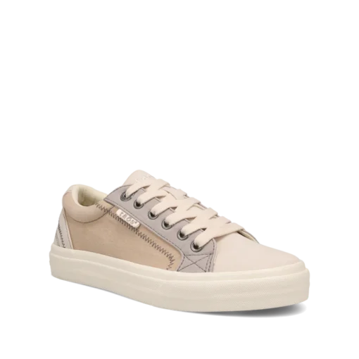 Taos Women's Plim Soul Sneaker featuring a premium canvas upper, lace-up design, removable Curves & Pods® footbed, and durable rubber outsole.