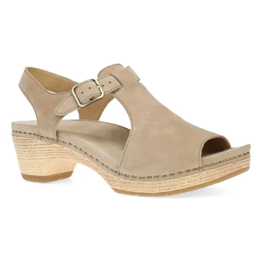 Dansko Women's Laverne Sandal in sand milled nubuck leather, featuring adjustable straps, a cushioned EVA footbed with memory foam, and a durable rubber outsole.