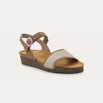 Naot Women’s Cecile Sandal with premium leather straps, adjustable closures, a contoured cork-latex footbed, and a shock-absorbing lightweight sole.