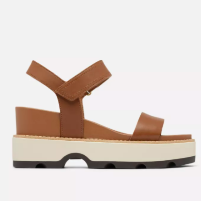 Sorel Women's Joanie IV Y-Strap Wedge Sandal with a sleek leather upper, cushioned footbed, adjustable ankle strap, and a stylish wedge heel for all-day comfort and chic versatility.