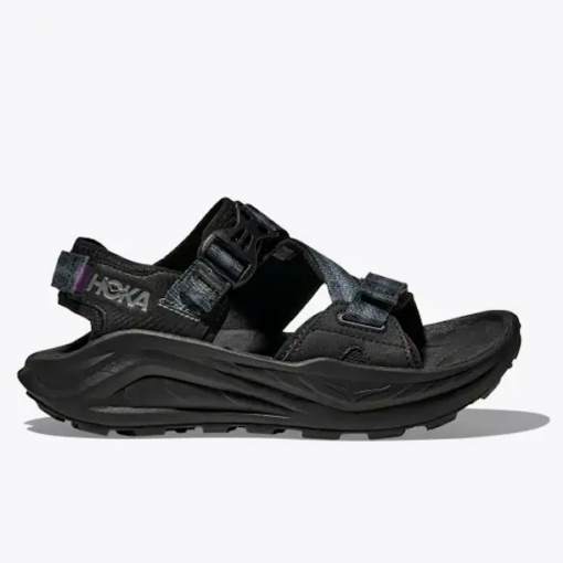 Hoka Men's Infini Hike TC Sandal with Vibram outsole, dual-density cushioned midsole, quick-drying upper, adjustable straps, and rugged outdoor design.