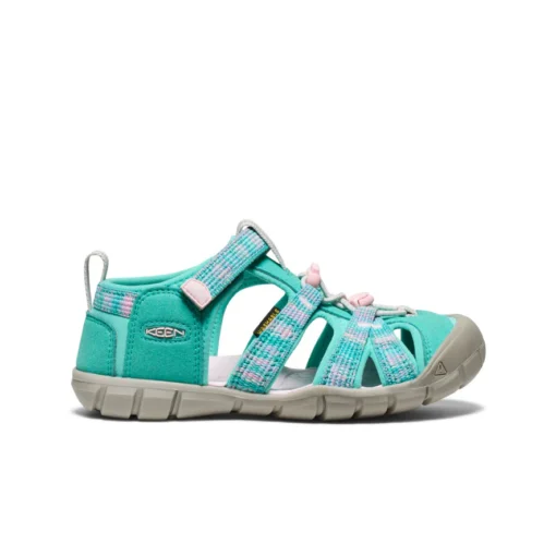 Keen Big Kid’s Seacamp II CNX Sandal with secure bungee lace, adjustable hook-and-loop strap, protective toe cap, and non-marking rubber outsole for traction.