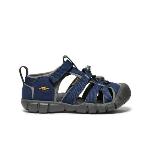 Keen Little Kid's Seacamp II CNX Sandal with secure bungee lace, adjustable hook-and-loop strap, protective toe cap, and non-marking rubber outsole for traction.