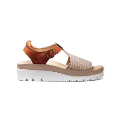 Samuel Hubbard Women's T-Strap Sandal with adjustable ankle strap, cushioned footbed, and lightweight rubber outsole for all-day comfort.